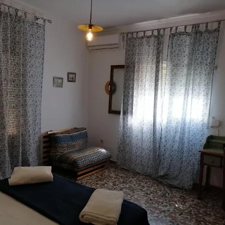 Quarto em Acomodações Particulares Casa Algarabía